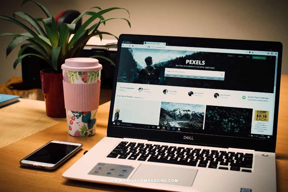 Website Assets on a Laptop in a work desk with mobile and coffee cup