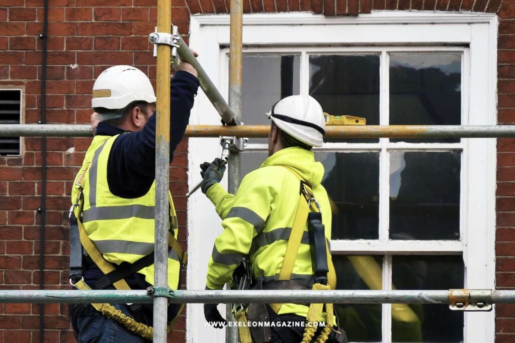 Construction workers inspecting a scaffold accident at a building site